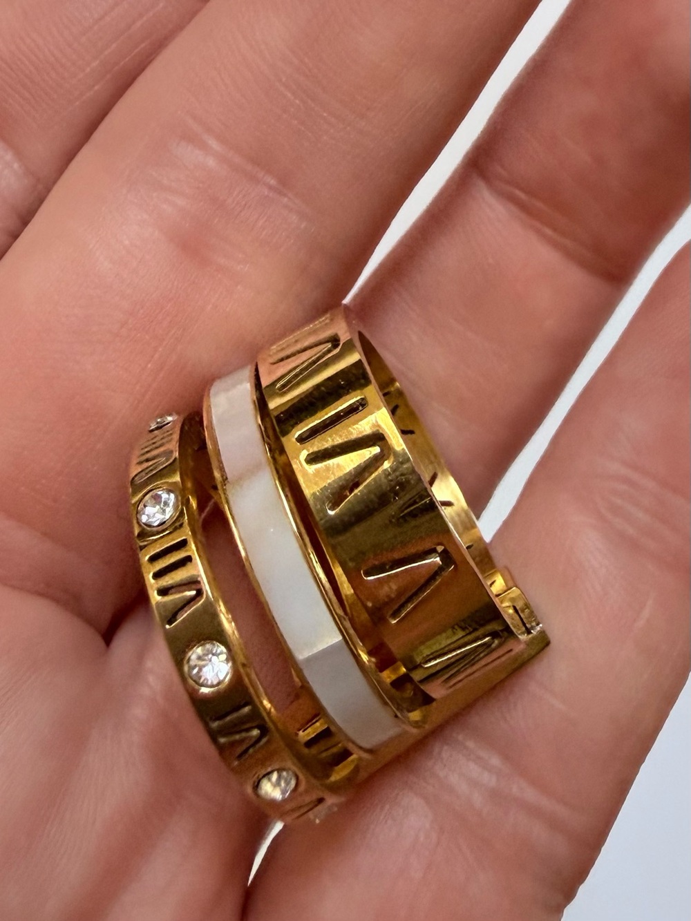 Gold tone triple ring with Roman numerals & Crystal Accents